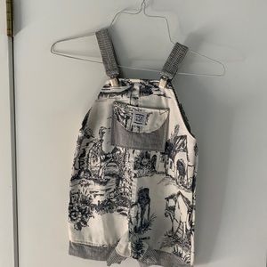 NWOT Little girls romper in black and white tioile. Size 18 -20 months.